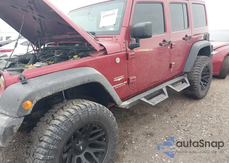 2011 Jeep Wrangler Unlimited Sahara z USA, uszkodzony, nr VIN 1J4BA5H11BL577325